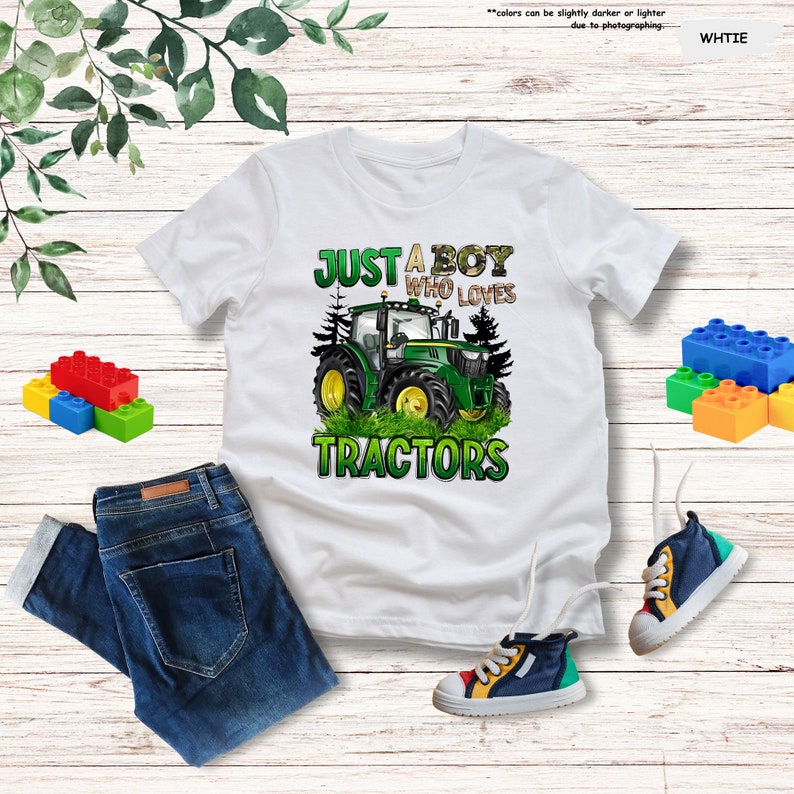 a shirt that says just a boy who loves tractors