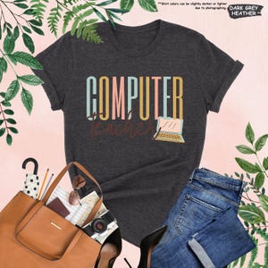 a women's t - shirt with the words computer rescue on it