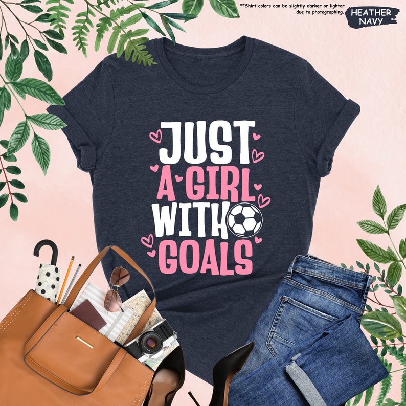 a t - shirt that says just a girl with goals
