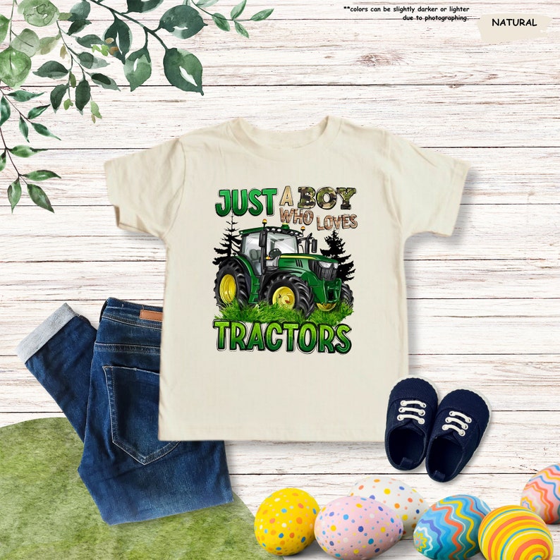 a t - shirt that says just a boy who loves tractors
