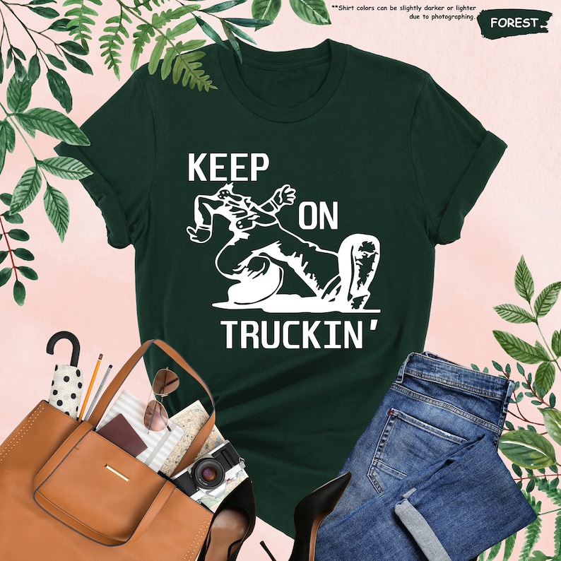 a t - shirt that says keep on truckin '