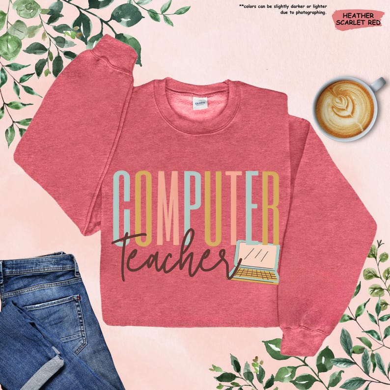 a computer teacher shirt with a cup of coffee next to it