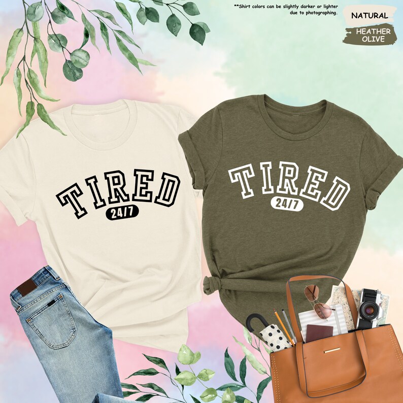 a pair of t - shirts with the word tired on them