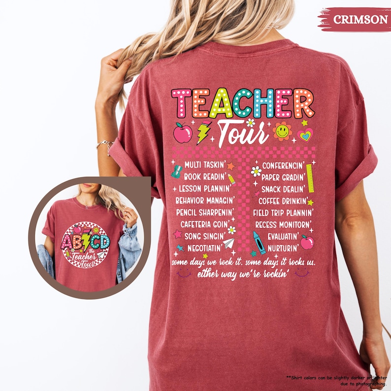 May include: A crimson red t-shirt with the text "TEACHER Tour" in colorful letters. The shirt has a list of tasks a teacher does, such as "Multi Tasking", "Book Readin", "Lesson Plannin", "Behavior Manacin", "Pencil Sharpenin", "Cafeteria Goin", "Song Singin", "Negotiatin", "Conferencing", "Paper Gradin", "Snack Dealin", "Coffee Drinkin", "Field Trip Plannin", "Recess Monitor", "Evaluatin", and "Nurturin". The text "some days we rock it. some days it rocks us. either way we're rockin'" is also on the shirt.
