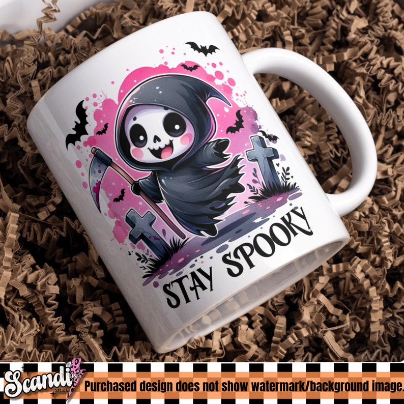 May include: White ceramic mug featuring a cartoon Grim Reaper character with a scythe, surrounded by bats and tombstones, with the text "STAY SPOOKY" in black. The design incorporates pink and black accents, perfect for Halloween.
