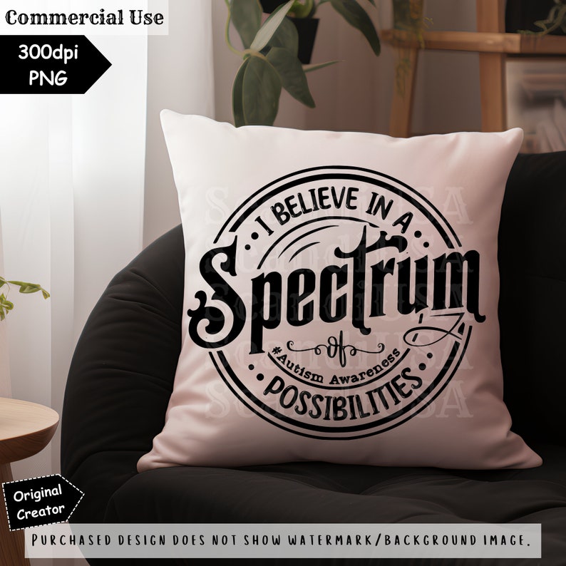 May include: A pink throw pillow with a black circular design that reads "I believe in a spectrum of possibilities" with the hashtag "#Autism Awareness".