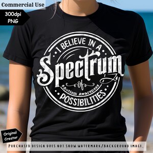 May include: A black t-shirt with a white circle design that says "I believe in a spectrum of possibilities" with the text "#Autism Awareness" inside the circle.