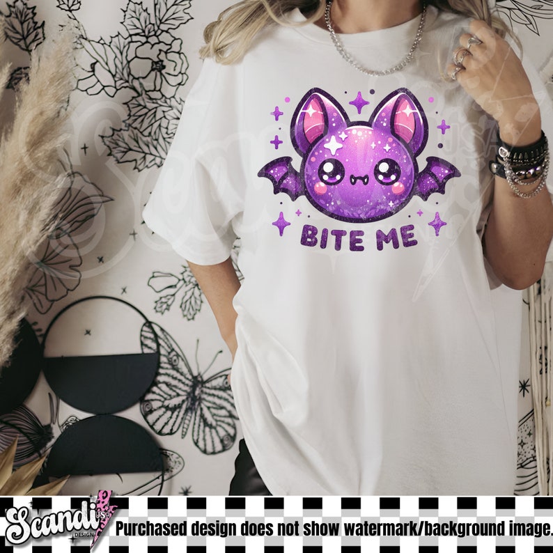 May include: White t-shirt with a purple cartoon bat with glitter and the text "Bite Me".