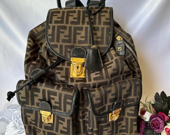 Vintage Fendi zucca backpacks with hardware in gold tone