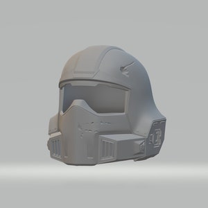 May include: A gray 3D printed helmet with a visor and a design on the side.