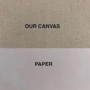 May include: A close-up of two textured surfaces. The top section is a beige canvas with the text "OUR CANVAS" in black. The bottom section is white paper with the text "PAPER" in black.