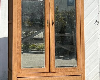 Old art deco cabinet in raw oak with mirror doors