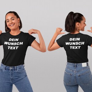 Pode incluir: Camiseta preta com texto branco que diz "Dein Wunsch Text" na frente e atr&aacute;s.