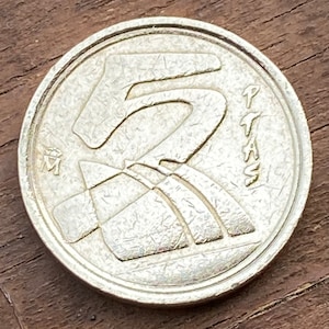 Five pesetas from the year 1998.