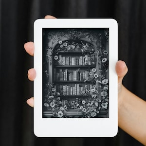 May include: A black and white image of a bookshelf filled with books, surrounded by flowers and vines. The bookshelf is ornate and has a decorative top. The image is displayed on a white e-reader.