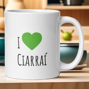 11 oz. white glossy ceramic mug ‘I love Ciarraí’ (Kerry, Irish language) black lettering & green heart | Ireland Irish county Munster