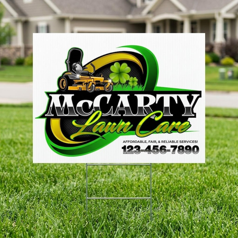 White corrugated yard sign staked in green residential lawn displaying bold landscaping logo with yellow zero turn mower, green clover and gold ribbon — outdoor signage for lawn maintenance and mowing service businesses
