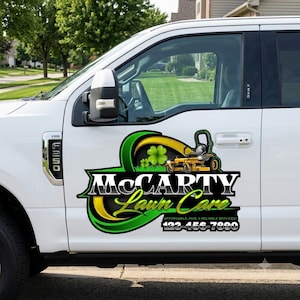 Example of yard maintenance logo design applied to a professional landscaping truck vehicle wrap.