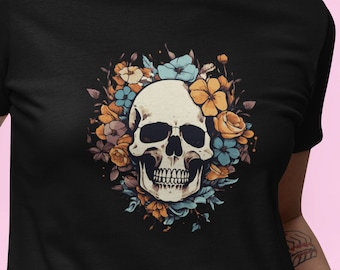 May include: Black t-shirt with a white skull surrounded by colorful flowers. The skull has a floral crown.