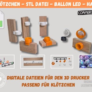Puede incluir: Imagen que muestra varios soportes de bloques de madera impresos en 3D para globos LED. Los soportes tienen diferentes diseños, con detalles en naranja y blanco. También incluye el texto "DIGITALE DATEIEN FÜR DEN 3D DRUCKER PASSEND FÜR KLÖTZCHEN."