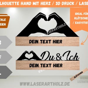 May include: Black silhouette of hands forming a heart shape, mounted on a wooden base. The text "DEIN TEXT HIER" is below the hands. The image also shows a second design with the text "Du & Ich" and "DEIN TEXT HIER". The image includes the text "DIGITALE DATEIEN".