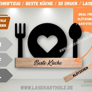 Könnte beinhalten: Schwarze Küchenwandkunst mit Gabel, Löffel und Teller mit Herz-Ausschnitt. Die Worte "Beste Küche" stehen auf einem Holzsockel. Enthält digitale Dateioptionen: .SVG, .DXF und .STL.