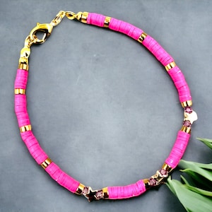 fushia pink heishi bracelet with golden star & crystal accents