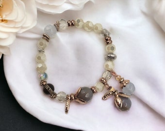 contemporary charm bracelet with golden highlights