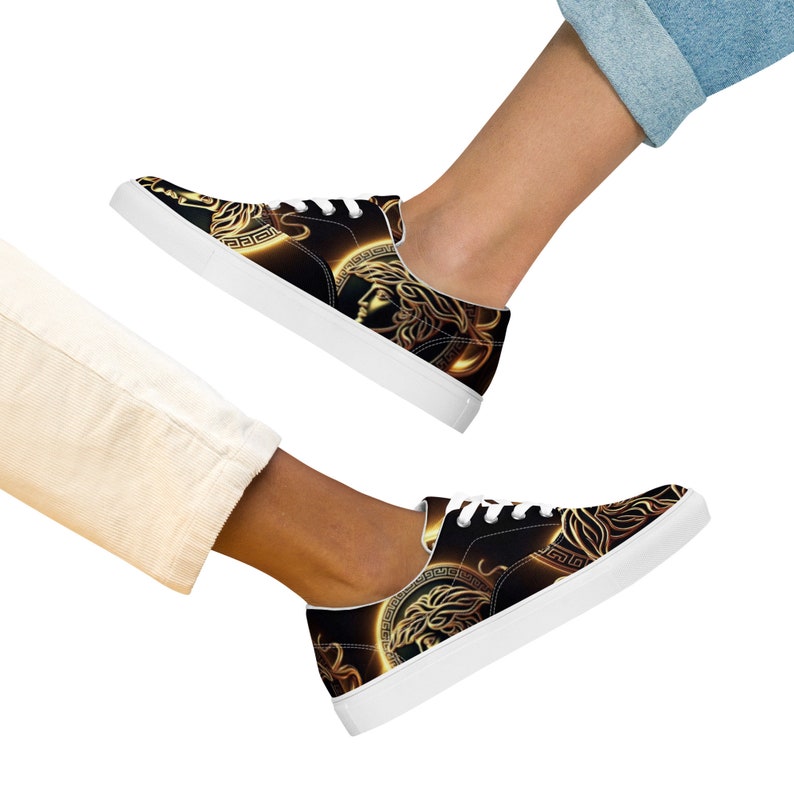Black and lilac women’s laced canvas shoes.