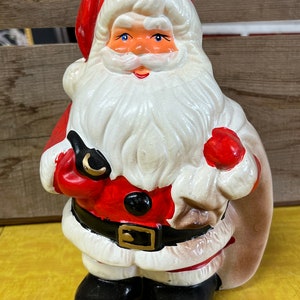 Kerstman Bankzak met speelgoed beeldje Vintage Christmas Decor Kerstdecoratie Saint Nick Handgeschilderde Hobbyist Pipe