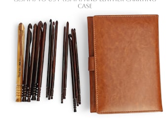 May include: Set of 13 rosewood crochet hooks in a brown leather carrying case. The hooks range in size from US E (3.5 mm) to US P (15 mm).