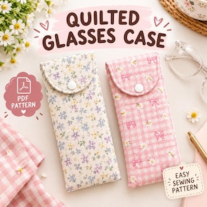 Könnte beinhalten: Zwei rechteckige, gesteppte Brillenetuis mit Druckknopfverschluss. Ein Etui zeigt ein kleines Blumenmuster in Blau, Gelb und Grün auf cremefarbenem Grund. Das andere Etui hat ein rosa Vichy-Karo-Muster mit kleinen weißen Gänseblümchen und rosa Schleifen.