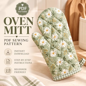 Puede incluir: Una manopla de horno acolchada con fondo verde salvia y un estampado floral de margaritas blancas con centro amarillo. La manopla tiene un borde a cuadros verdes y blancos en el puño y una pequeña trabilla. Texto: PDF PATTERN OVEN MITT.