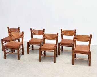 Set of six brutalist leather dining chairs