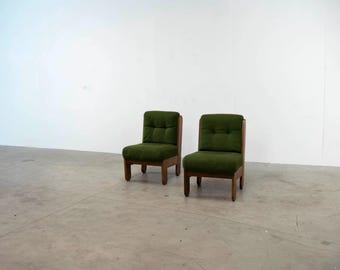 Set of two French green lounge chairs