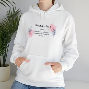 Unisex Heavy Blend™ Hooded White Sweatshirt Perfect for school and outside activities .It feels soft and warm, perfect choice for cold days
