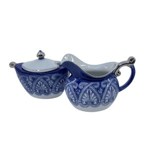 vintage bombay blue and white porcelain sugar & creamer set with silver accents