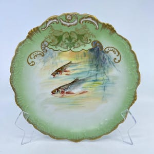 antique limoges france hand painted porcelain plate with fish design gold accents