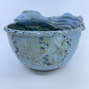 timberlate ceramic arts handcrafted ceramic bowl with fish & starfish design
