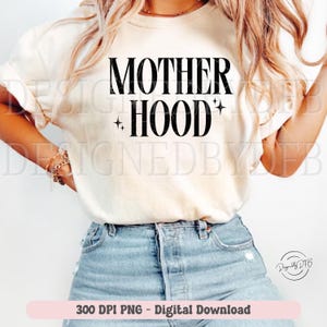 May include: Cream-colored t-shirt with the words "MOTHER" above "HOOD" in bold black letters, with star accents. The shirt is paired with blue denim shorts. The image also includes the text "300 DPI PNG - Digital Download".