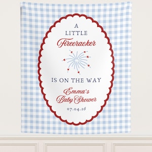 May include: A baby shower banner with a blue and white gingham background. The banner has a red scalloped oval with the text "A Little Firecracker Is On The Way" and "Emma's Baby Shower 07.04.26".