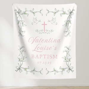 May include: White baptism banner with a green floral border and a pink cross with two doves. The text reads "Valentina Louise's Baptism 07.13.25".