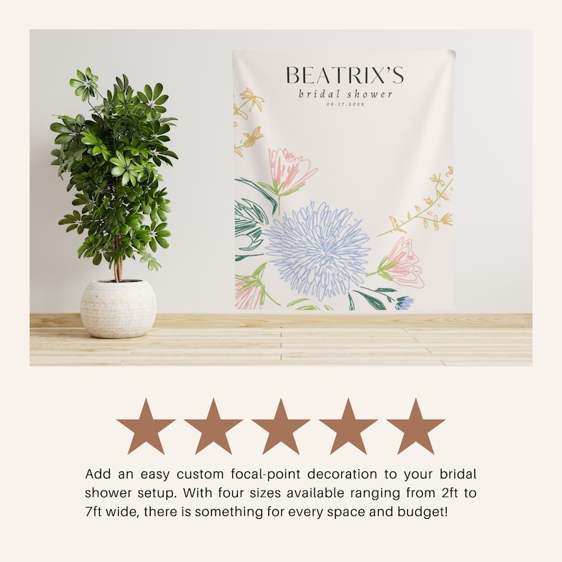 May include: A white backdrop with a floral design in shades of blue, pink, and green. The text "BEATRIX'S bridal shower 06.17.20XX" is printed at the top of the backdrop.