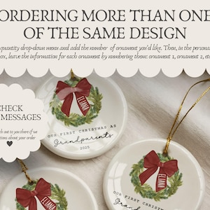 May include: Three round white ceramic ornaments featuring a green wreath illustration with a red bow and the name Eliana. Text reads: ORDERING MORE THAN ONE OF THE SAME DESIGN, CHECK ETSY MESSAGES, OUR FIRST CHRISTMAS AS GRANDPARENTS 2025.