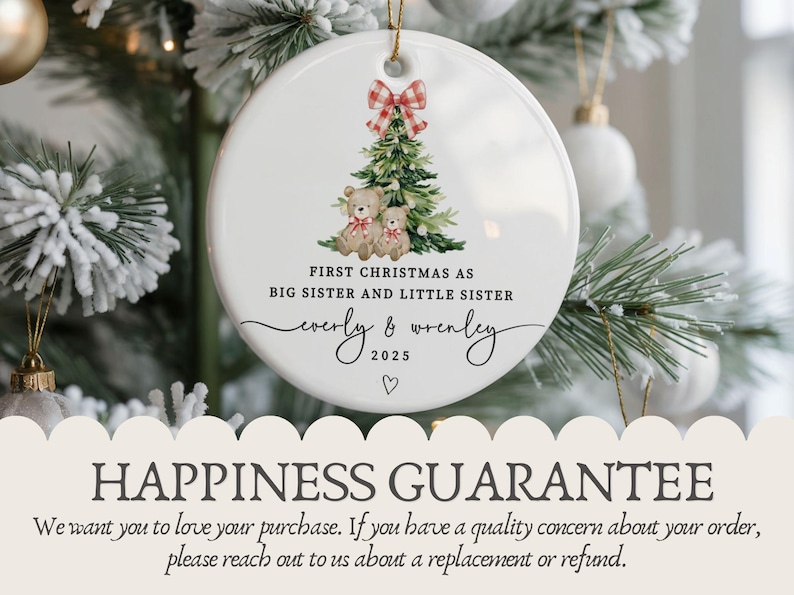 May include: White ceramic Christmas ornament with a festive design. It features a Christmas tree, teddy bears, and a red and white plaid bow. Text reads "First Christmas as Big Sister and Little Sister" with names and the year 2025.