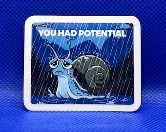 May include: A square sticker with rounded corners featuring a blue cartoon snail with a dark shell, crying in the rain. The text "YOU HAD POTENTIAL" is printed in white capital letters at the top against a dark blue background with rain streaks.