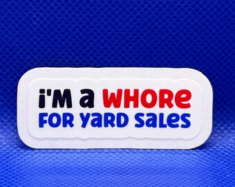May include: A rectangular white sticker with rounded corners featuring the text "i'm a WHORE FOR YARD SALES" printed in a bold, multi-colored font. The word "i'm" is black, "WHORE" is red, and "FOR YARD SALES" is blue.
