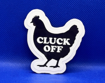 May include: A die-cut sticker featuring a black silhouette of a chicken with a white border. The text CLUCK OFF is printed in bold white capital letters across the center of the chicken's body, creating a high-contrast graphic design element.