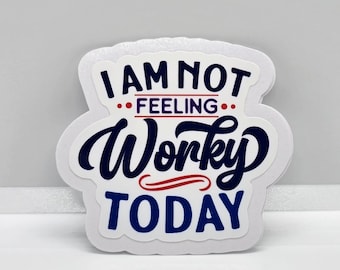 May include: White sticker with blue and red text that reads "I am not feeling wonky today".