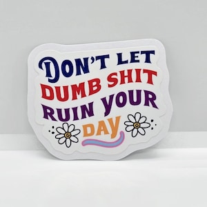 Don't let dumb stuff ruin your day - Bring a smile to your workspace with our hilarious office humor sticker!